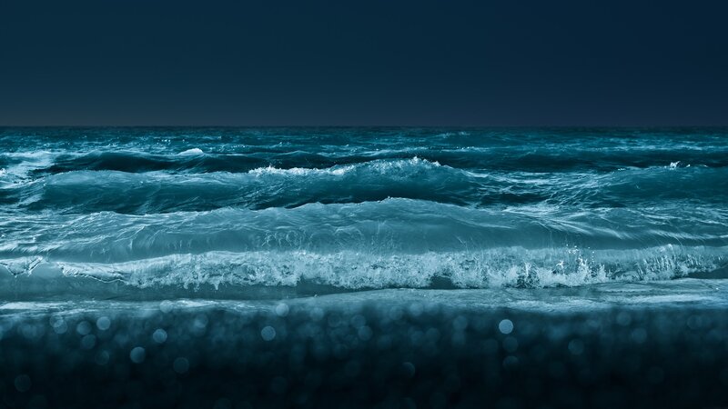 Dark ocean waves at night