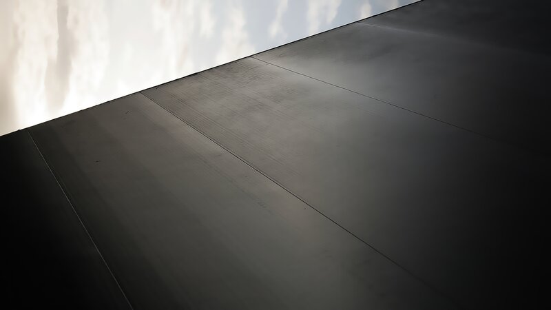 dark panel against cloudy sky