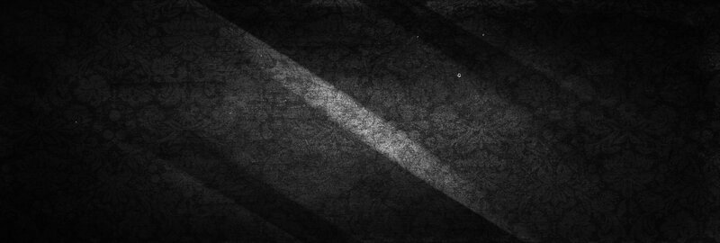 dark patterned surface with light beam