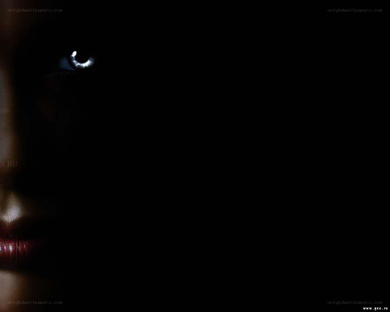dark portrait with glowing eye