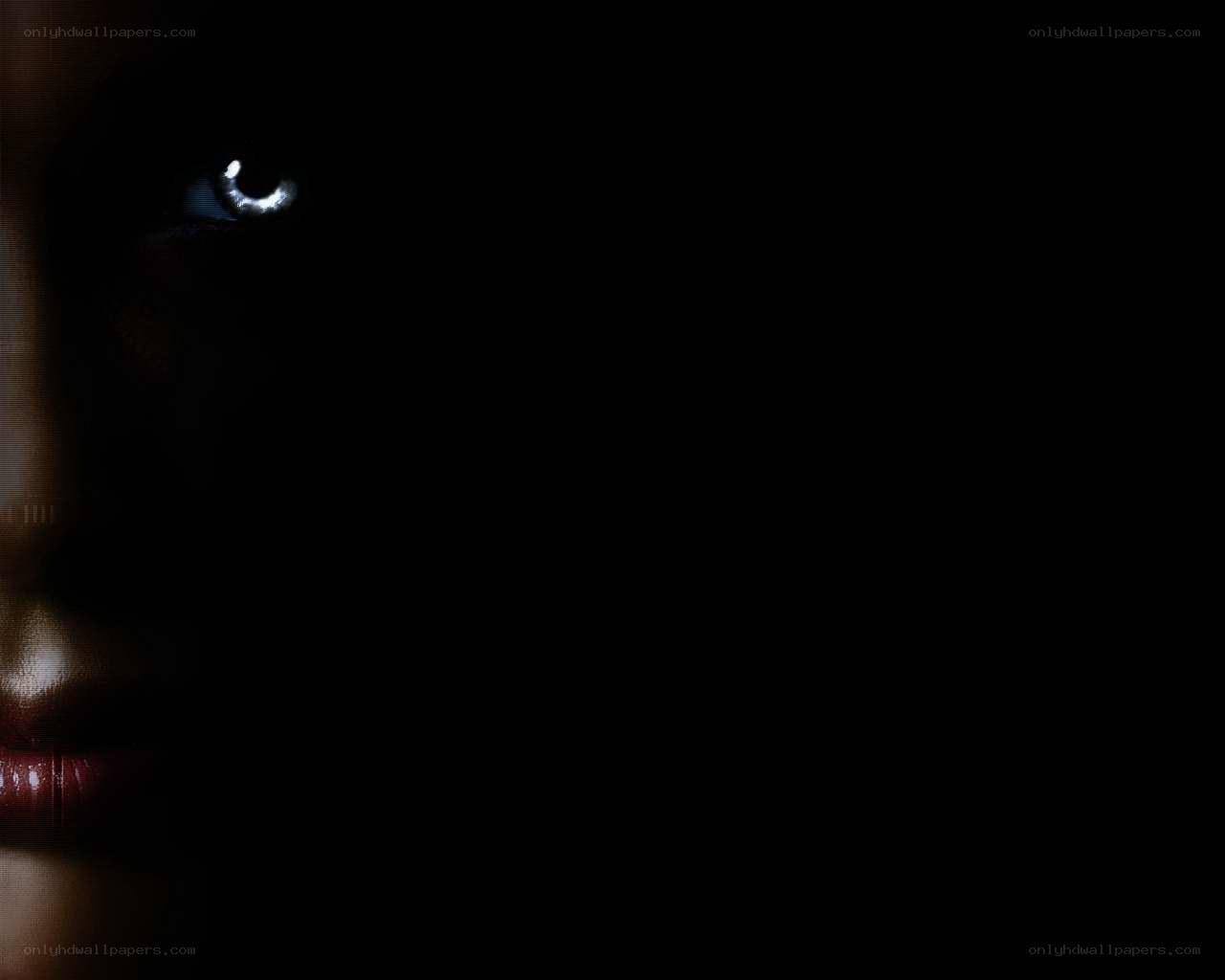 dark portrait with glowing eye