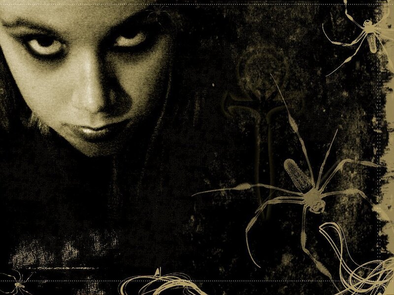 dark portrait with spiders