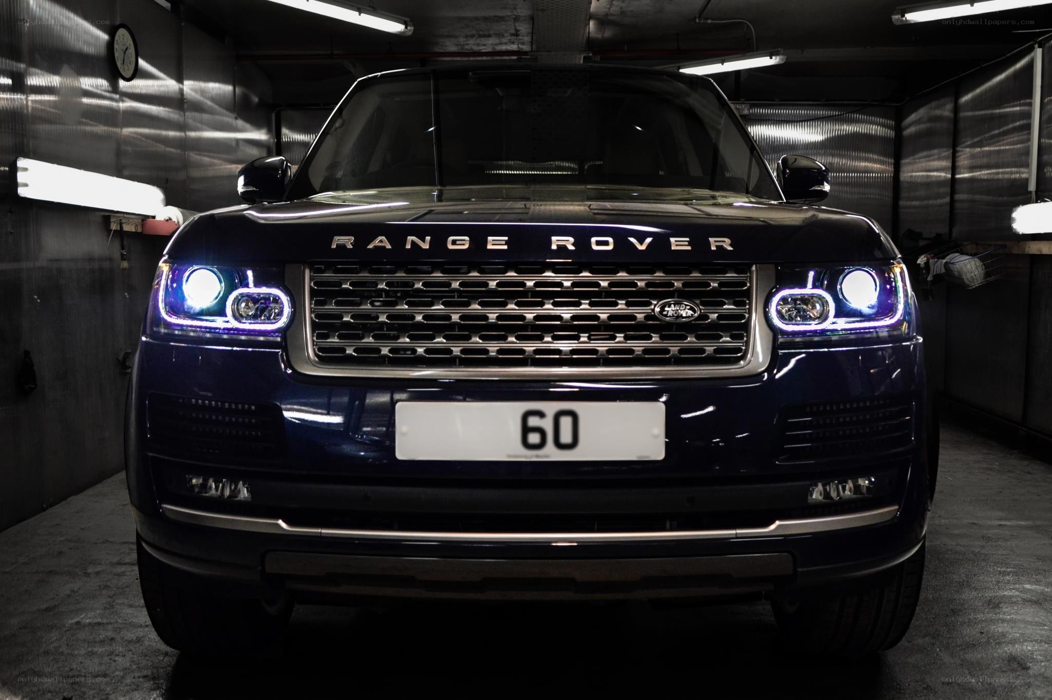 Dark Range Rover in garage