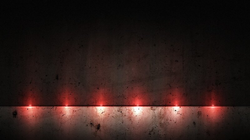 dark red lights on concrete