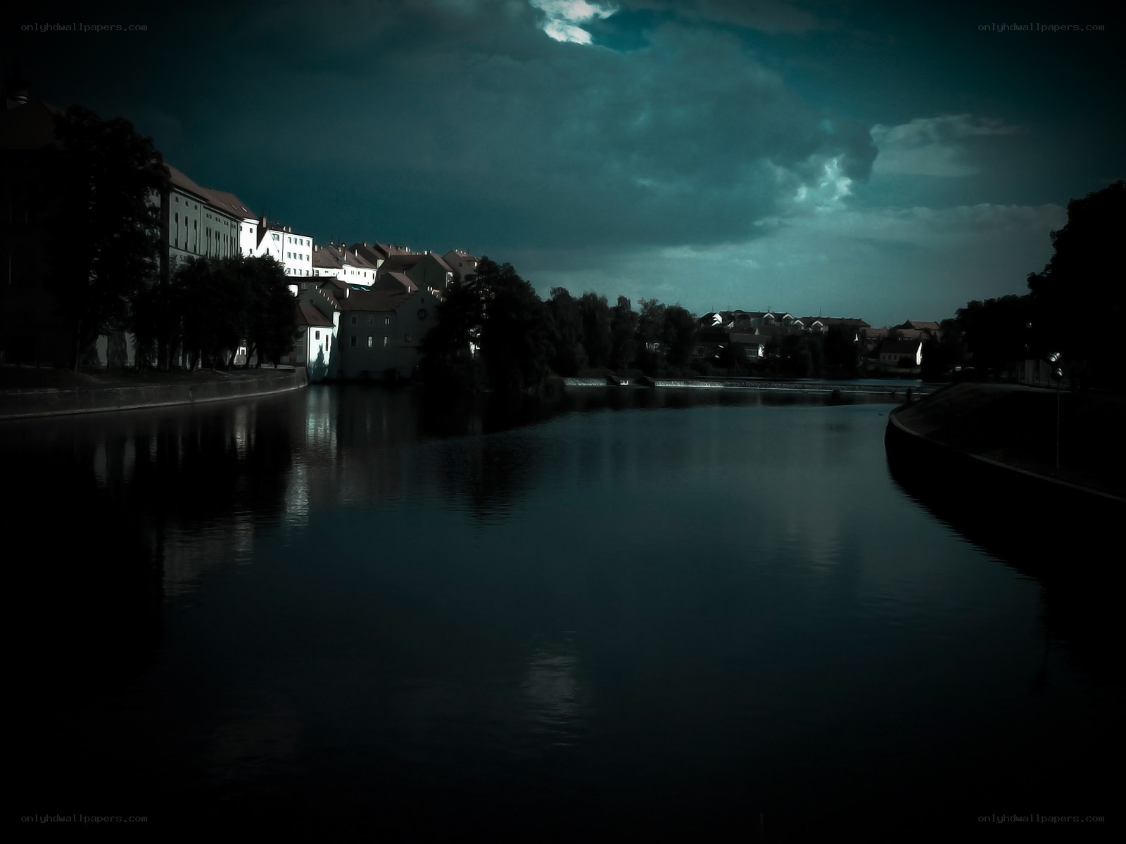 Dark river at night