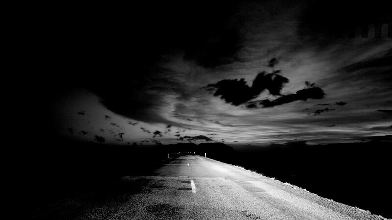 Dark road at night