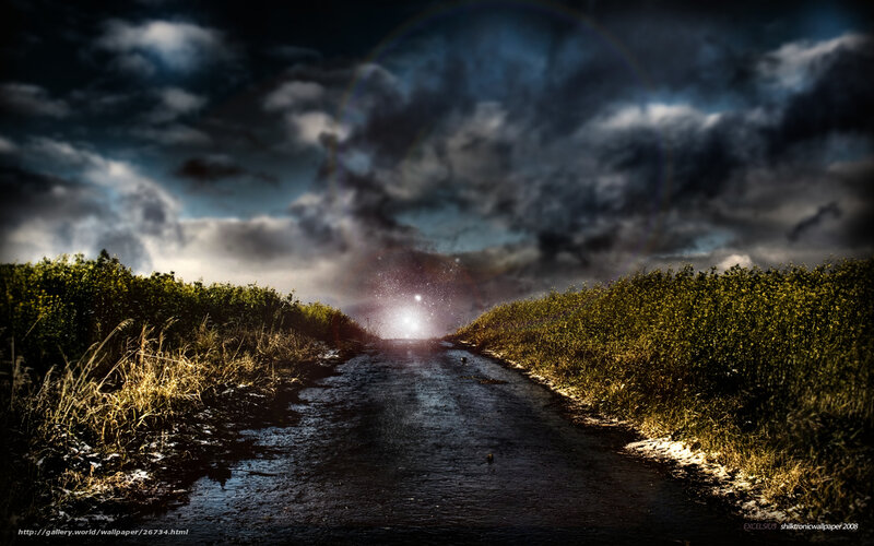 Dark road under stormy sky