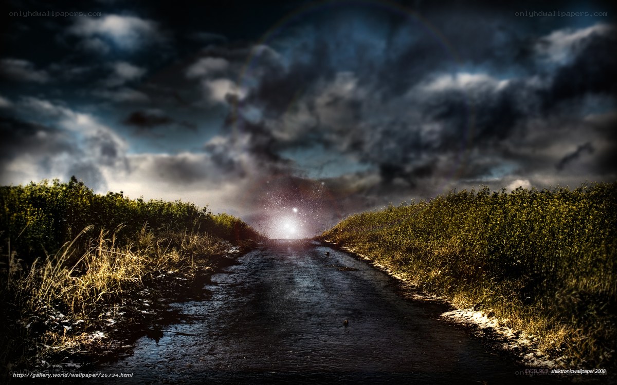 Dark road under stormy sky