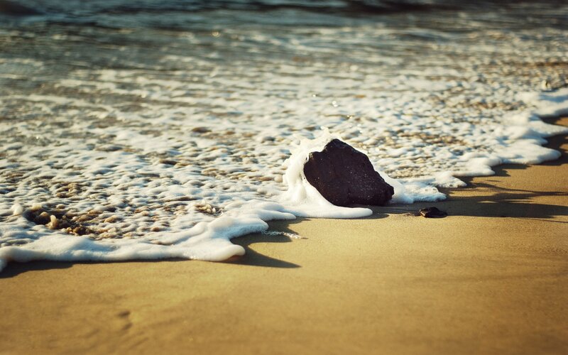Dark Rock on Beach