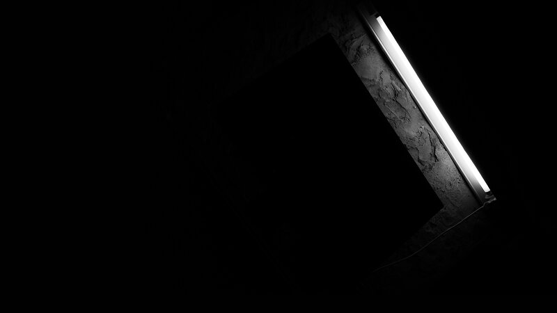 dark room with fluorescent light
