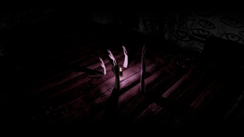 Dark room with hands and candle