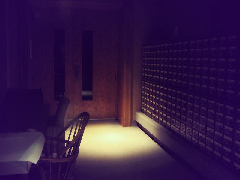 dark room with mailboxes