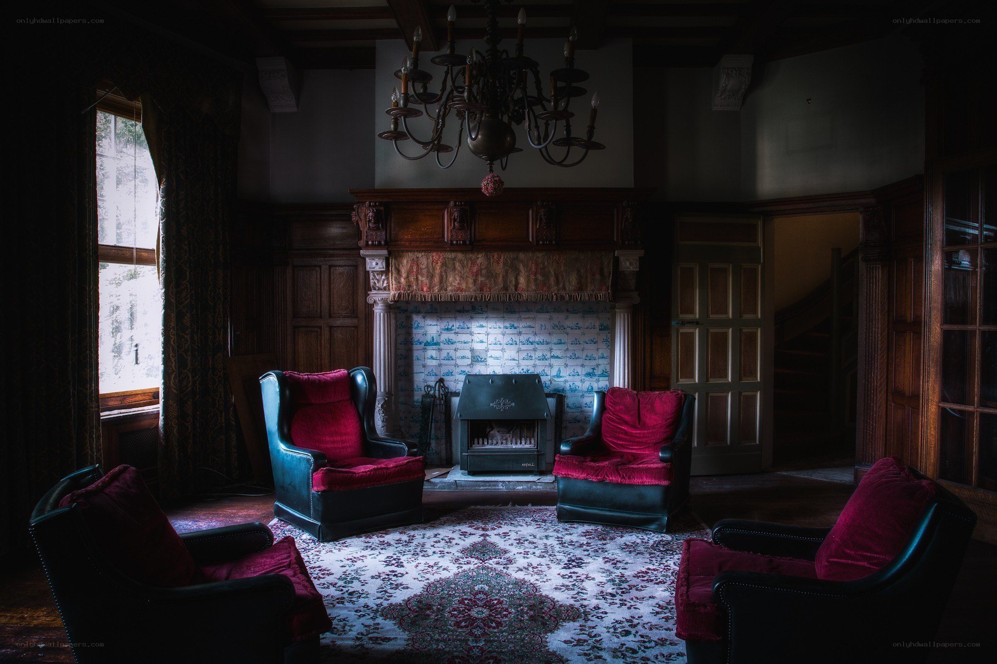 Dark room with red chairs