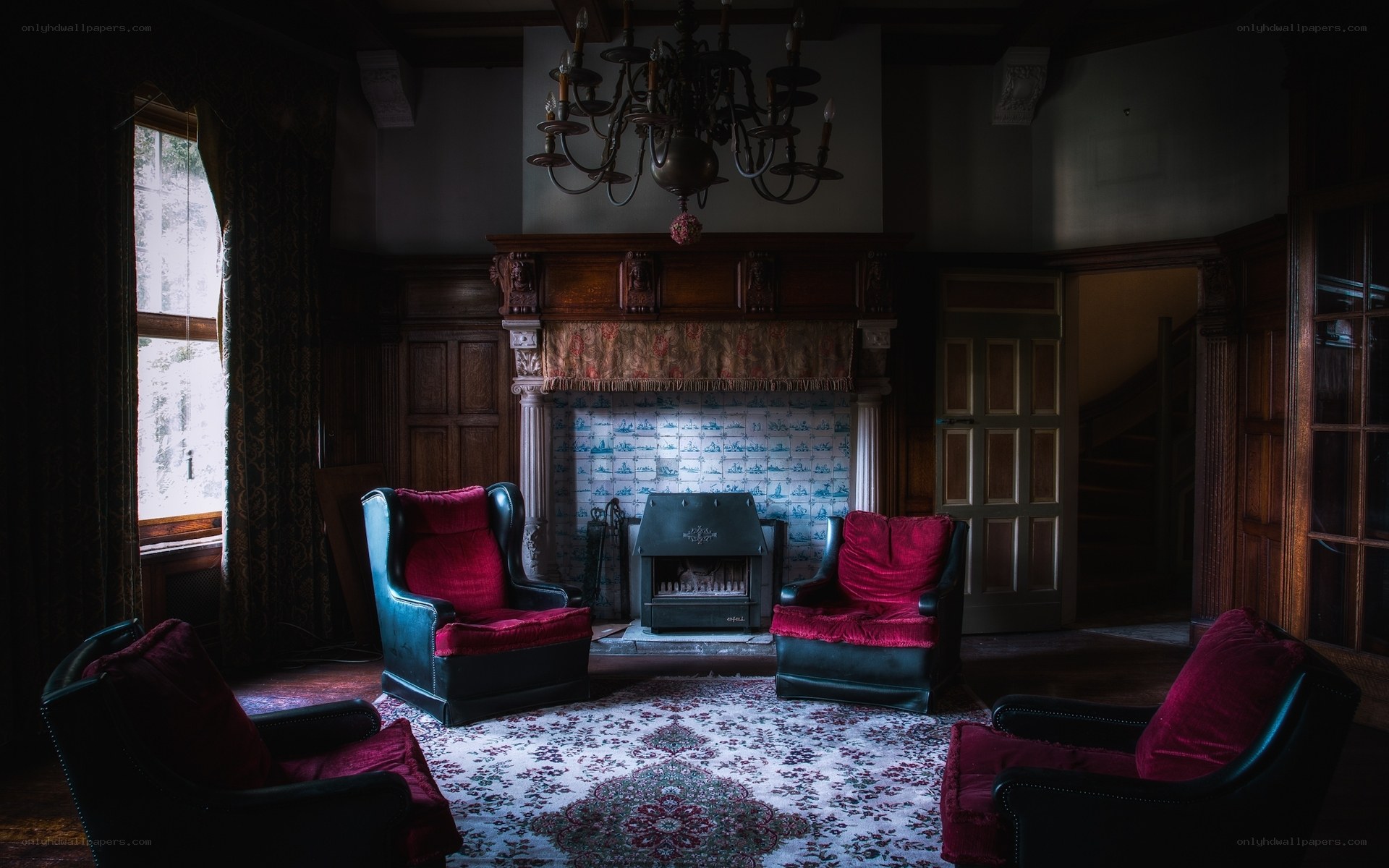 Dark room with red chairs