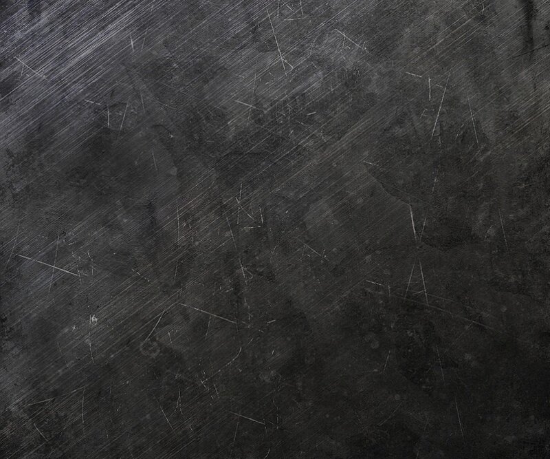 dark scratched metal surface