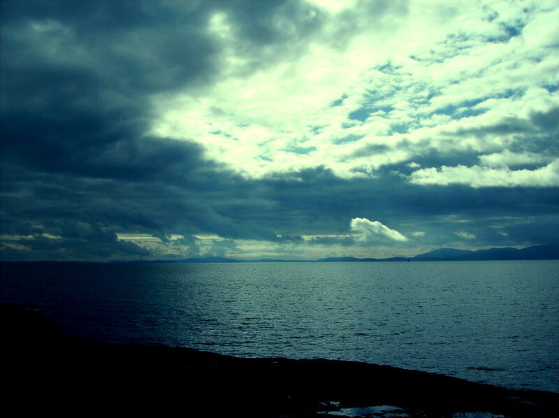 Dark Sea under Cloudy Sky