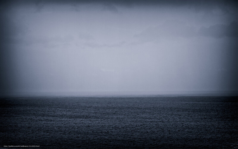 dark sea under stormy sky