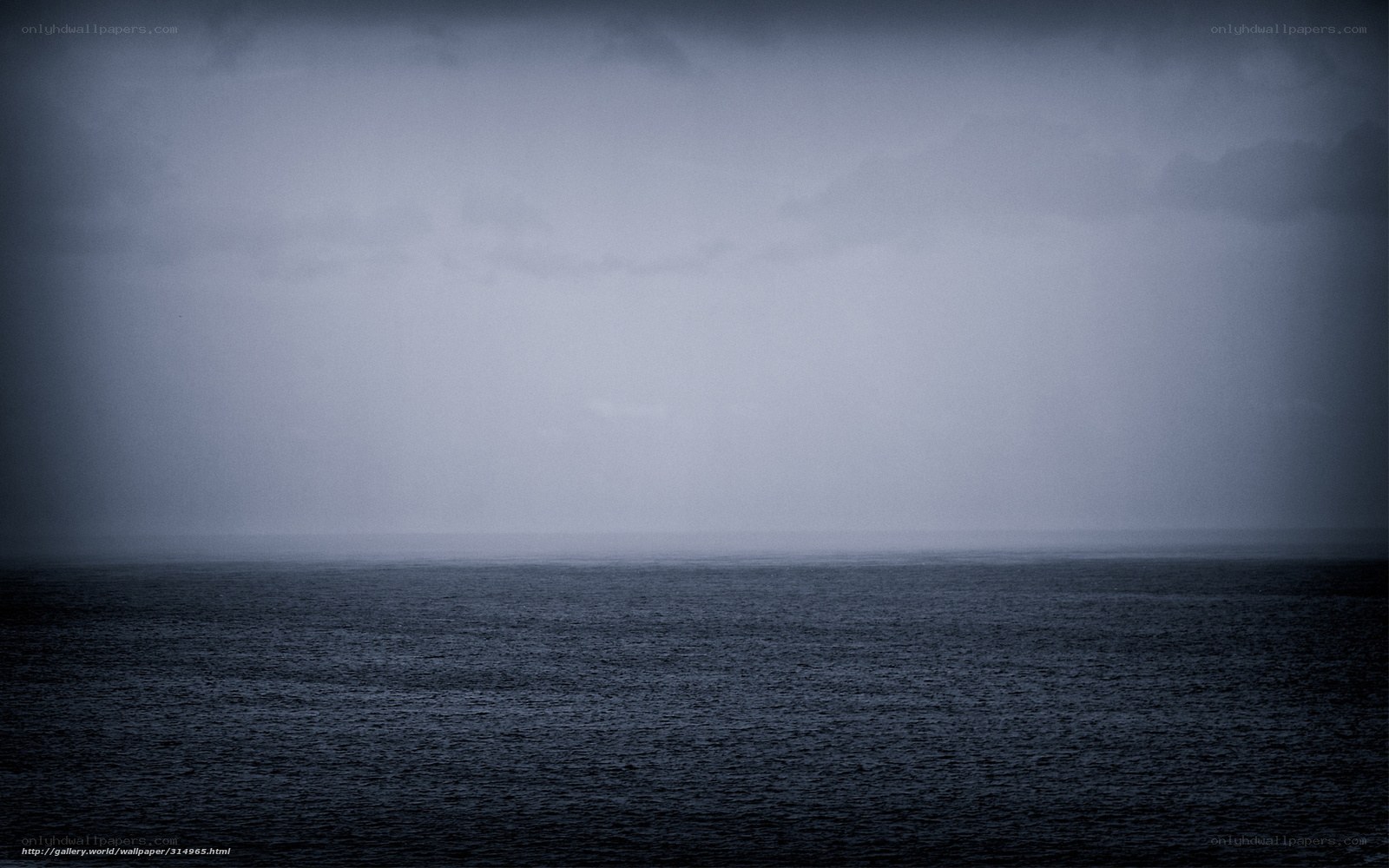 dark sea under stormy sky