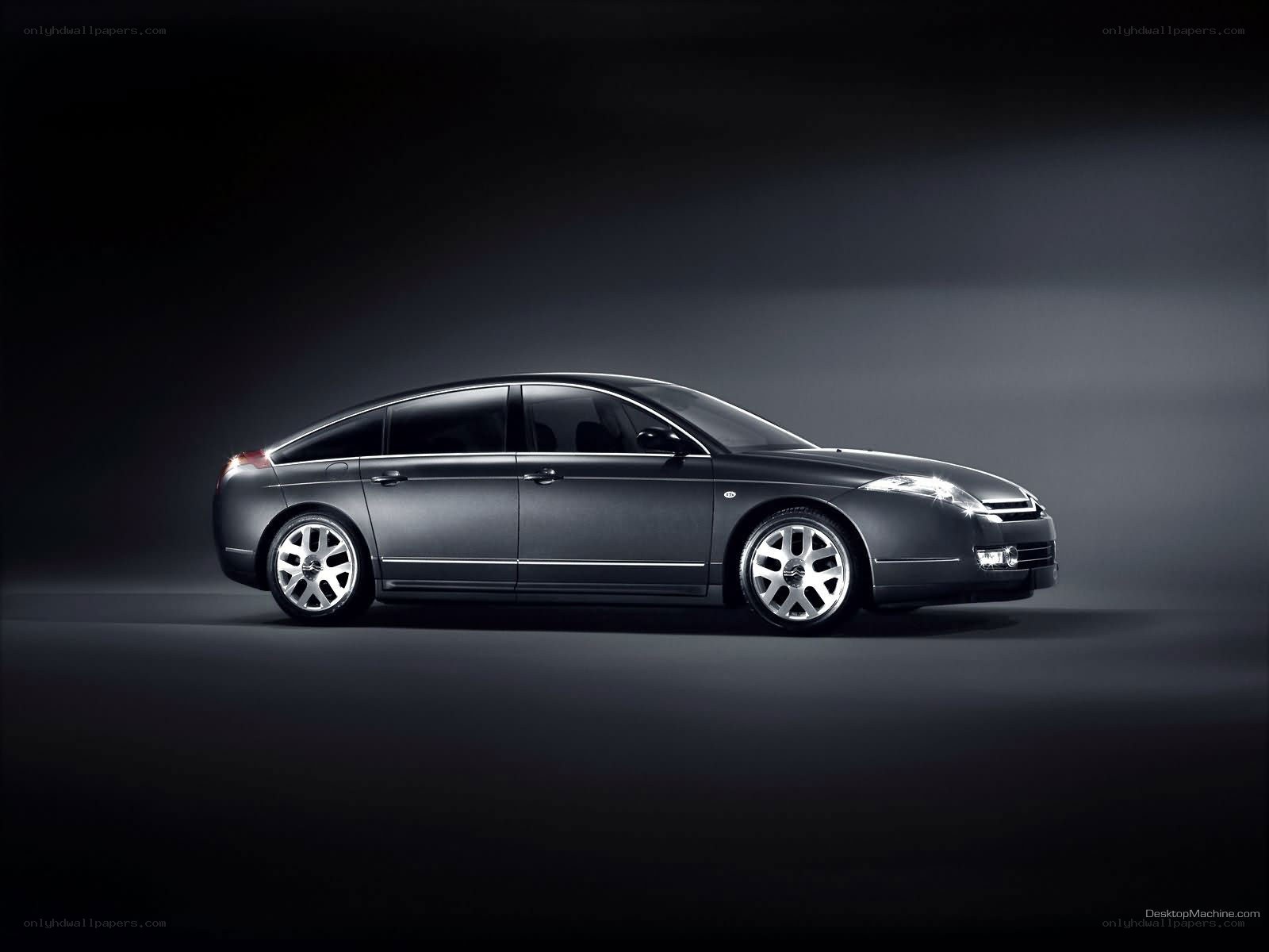 dark sedan car in studio
