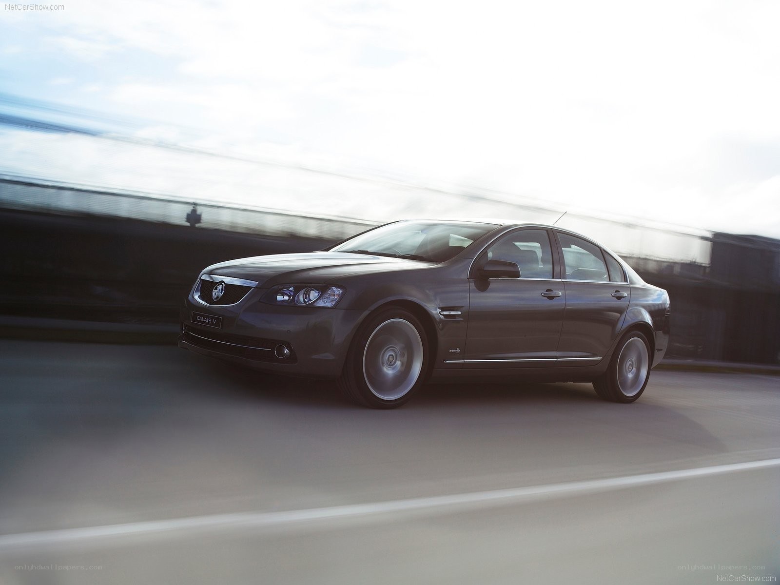 dark sedan in motion