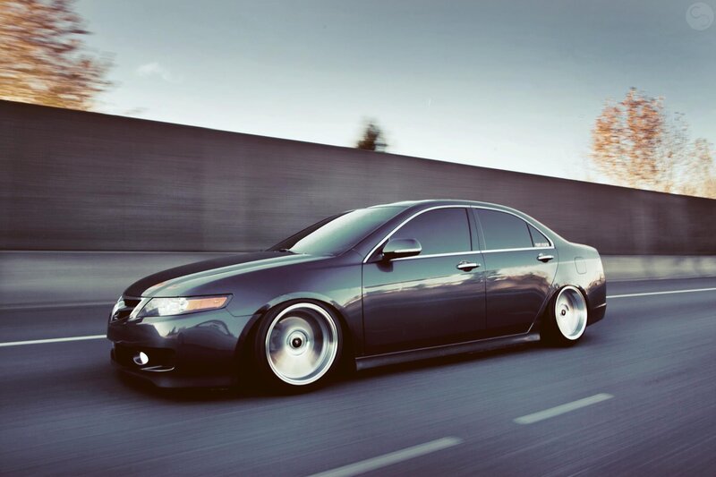 Dark sedan in motion