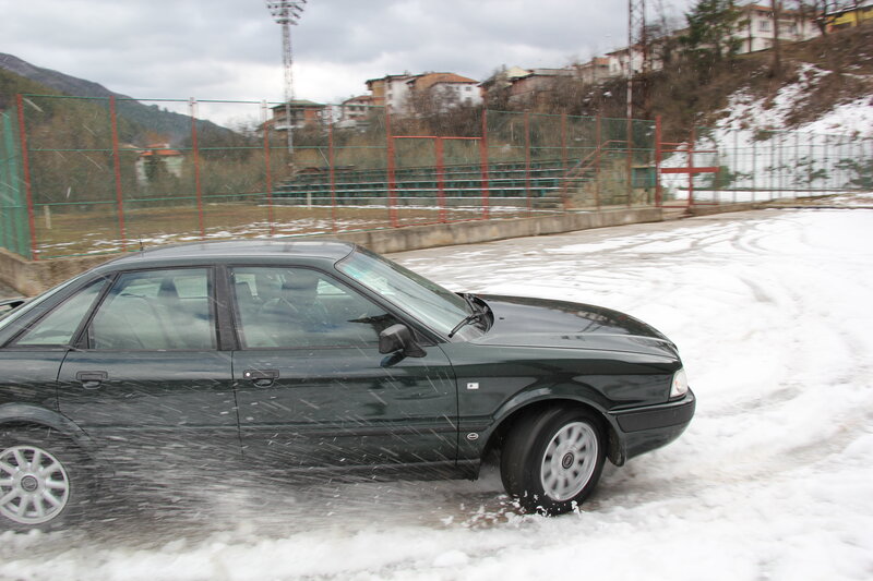 Dark Sedan in Snow — Black