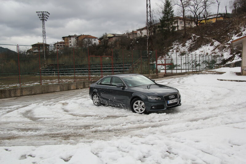Dark Sedan in Snow — Gray