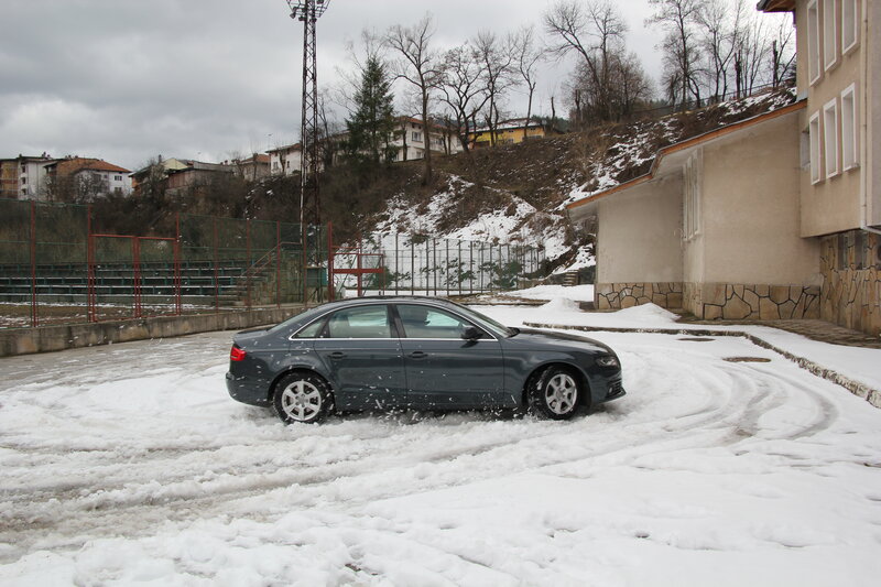 Dark Sedan in Snow — White