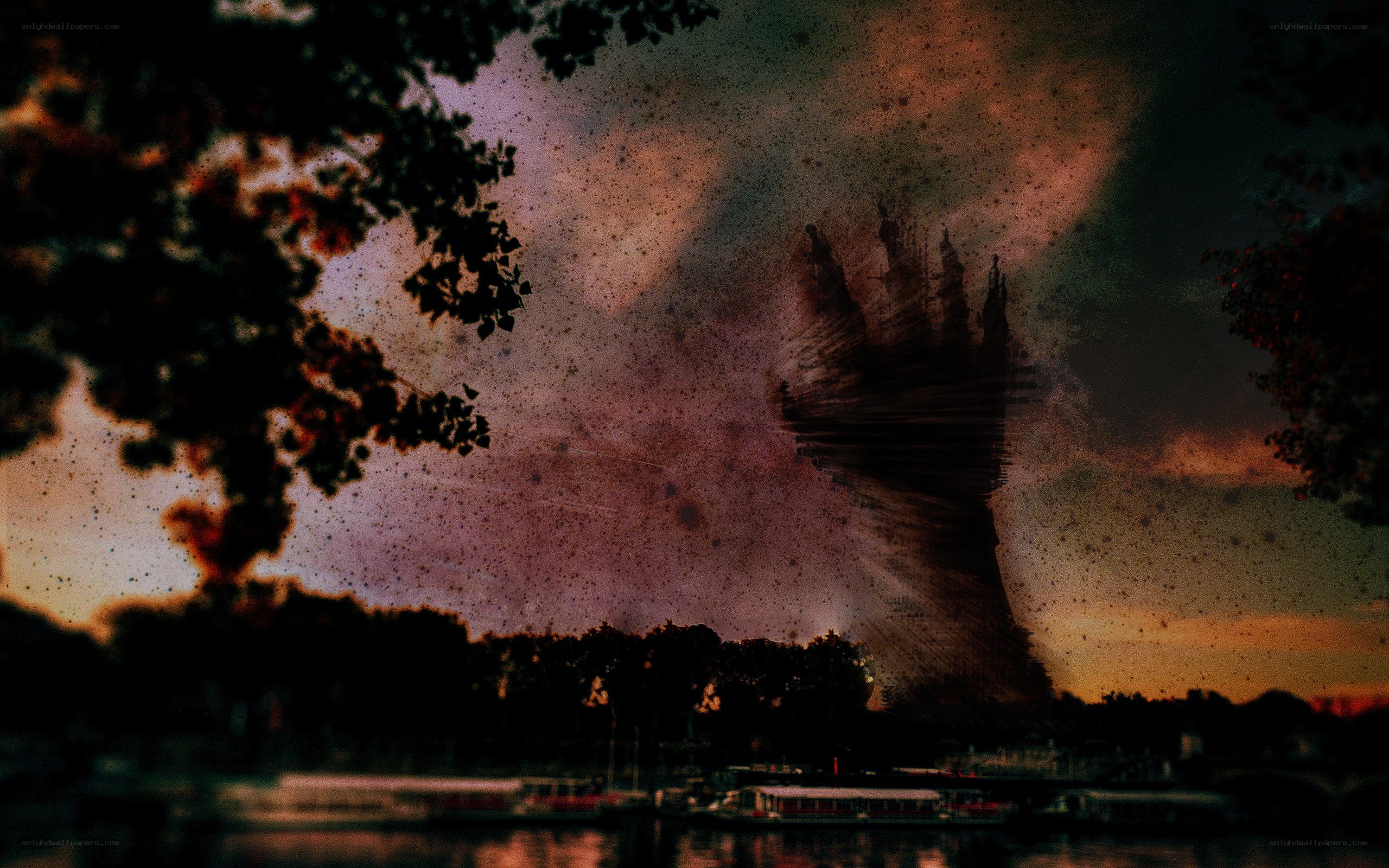 Dark silhouette over river at dusk