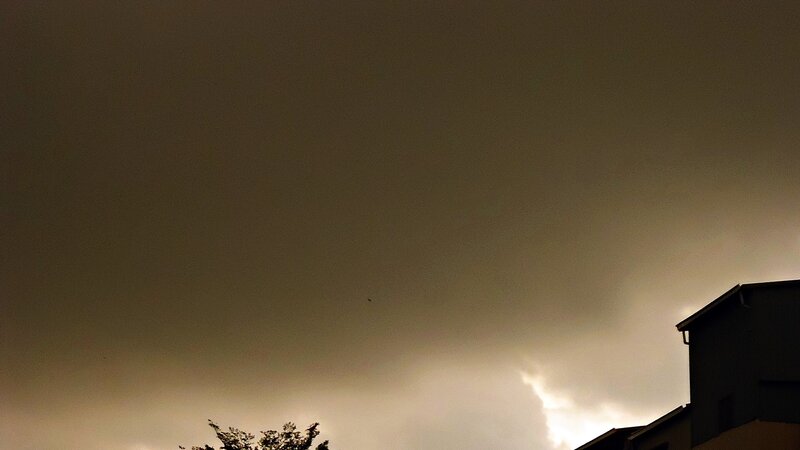 dark sky over buildings