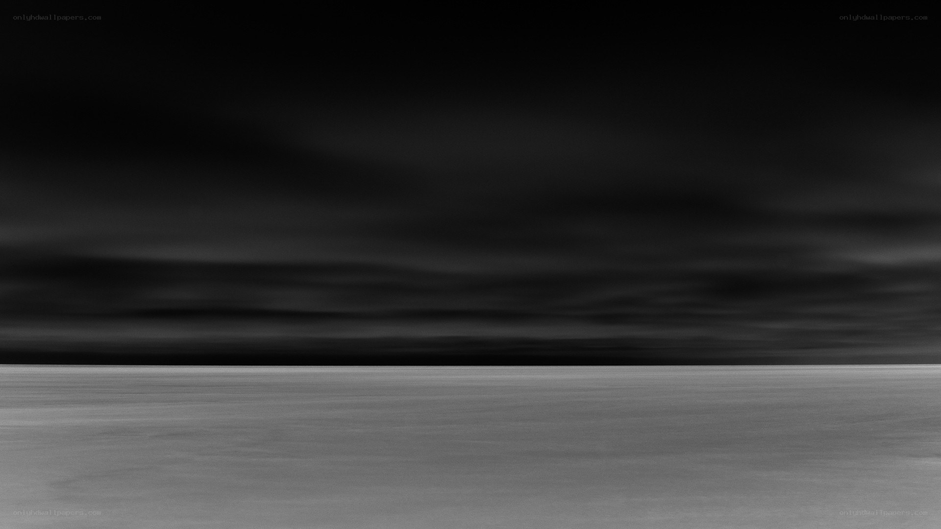 Dark sky over flat landscape