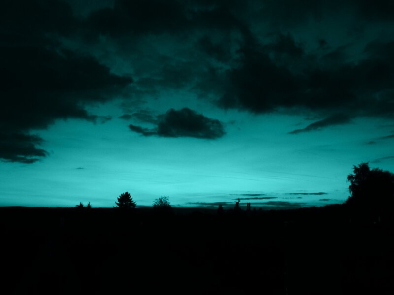dark sky with teal glow