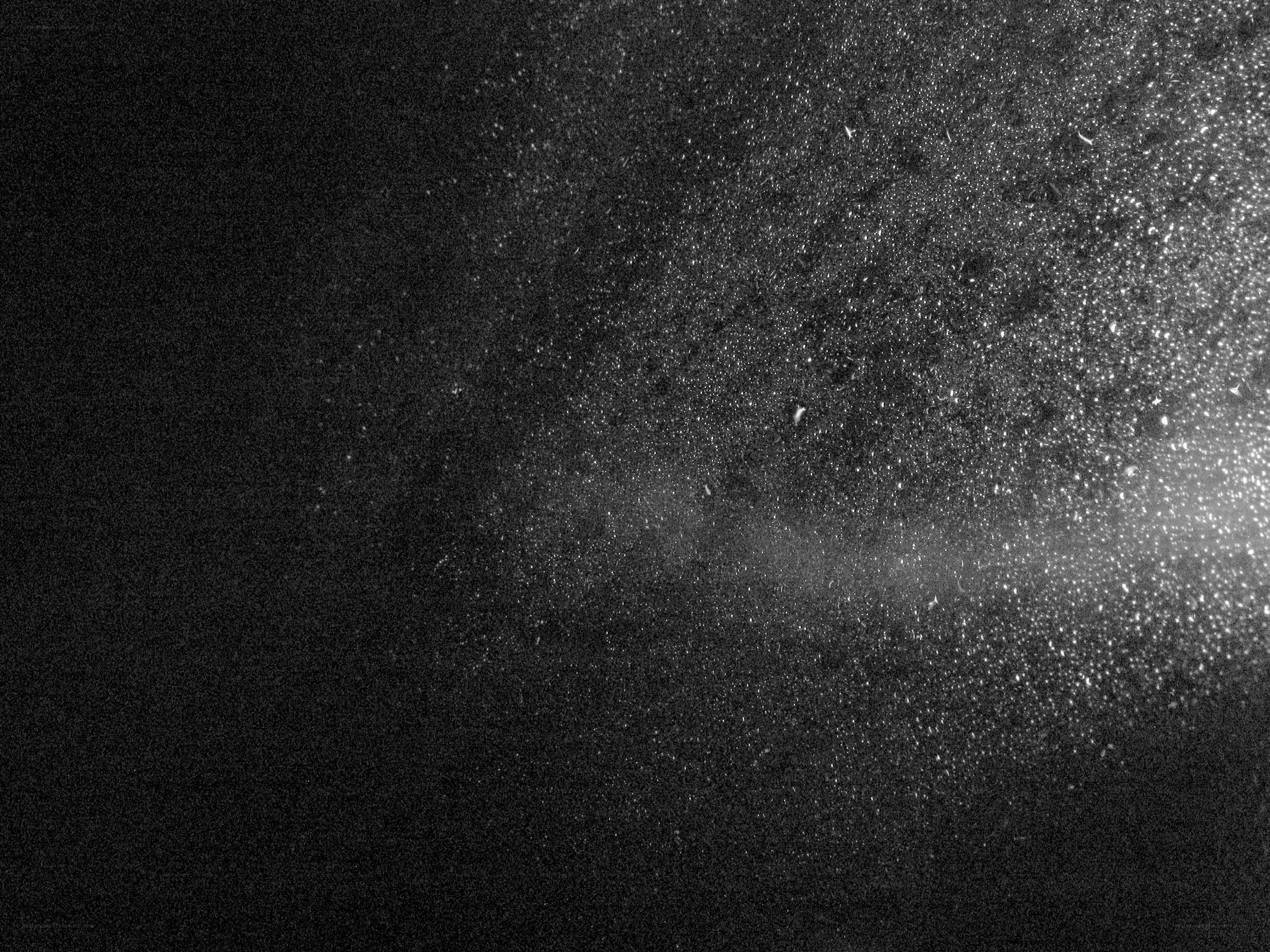 dark space with scattered particles