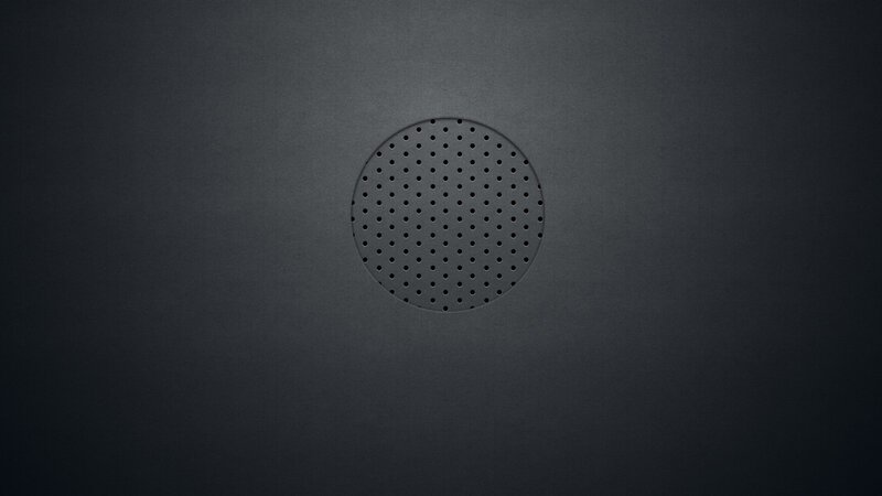 dark speaker grille background