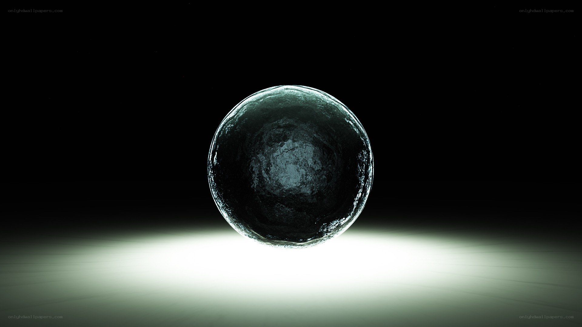 dark sphere on lit surface
