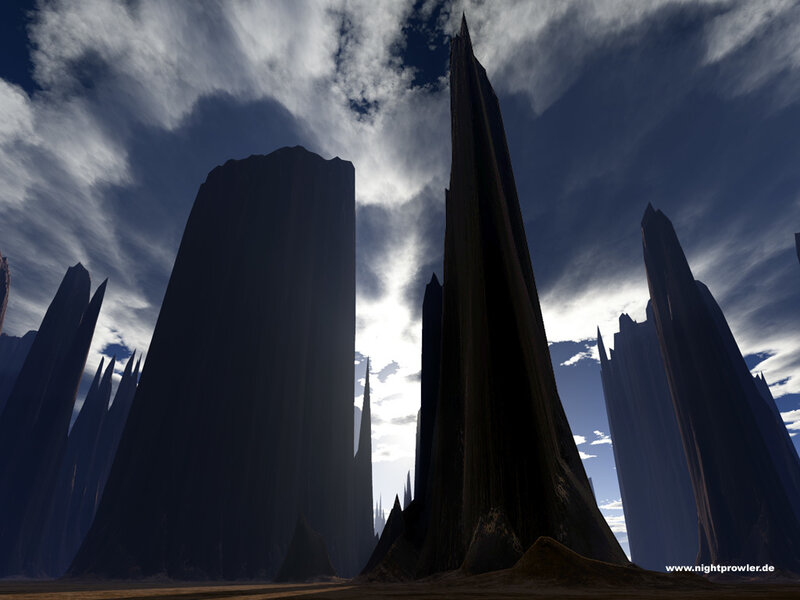 Dark spires under cloudy sky