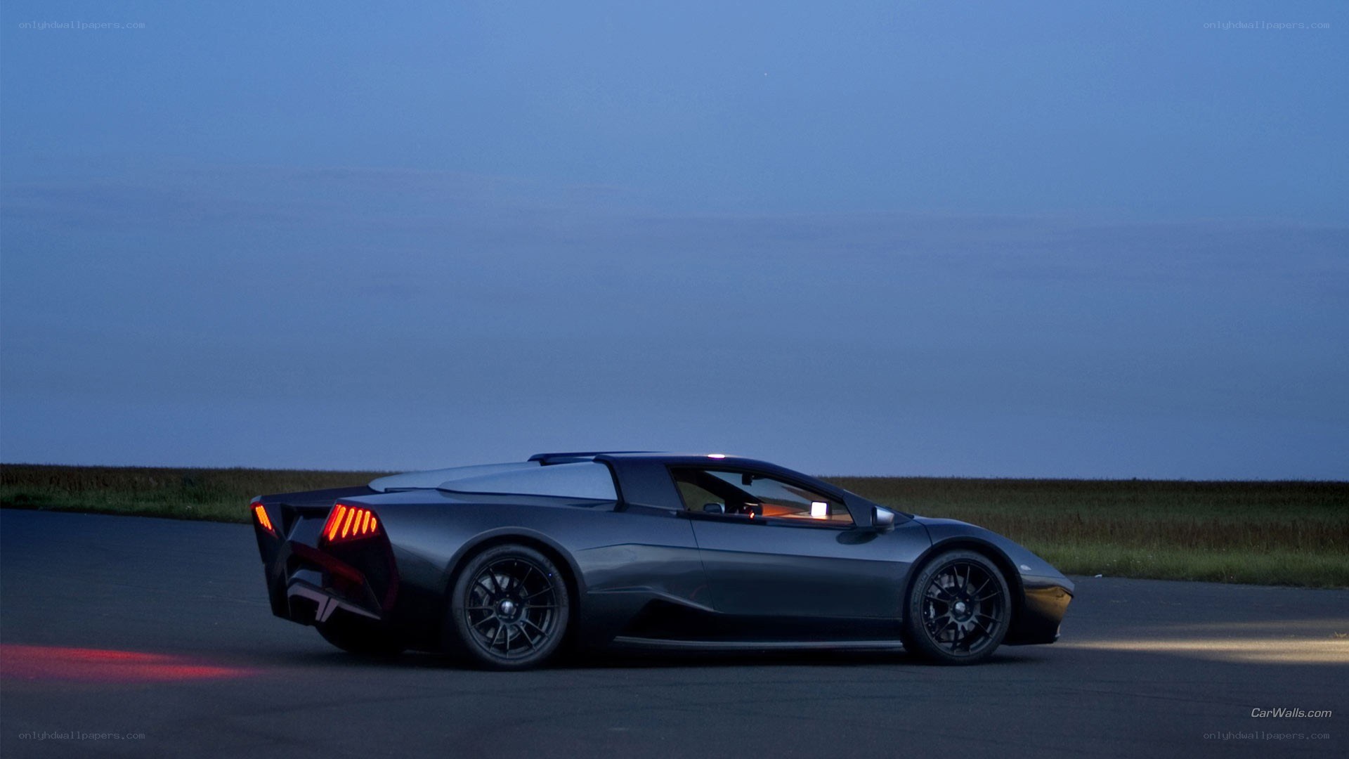 dark sports car at dusk