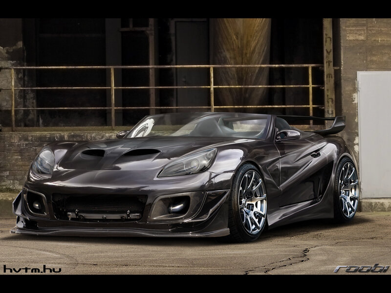 dark sports car in industrial setting