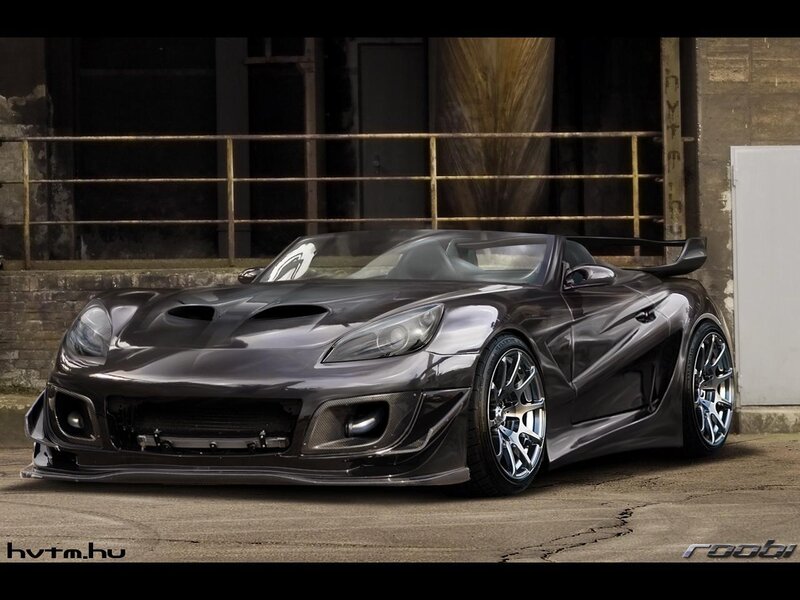 dark sports car in industrial setting