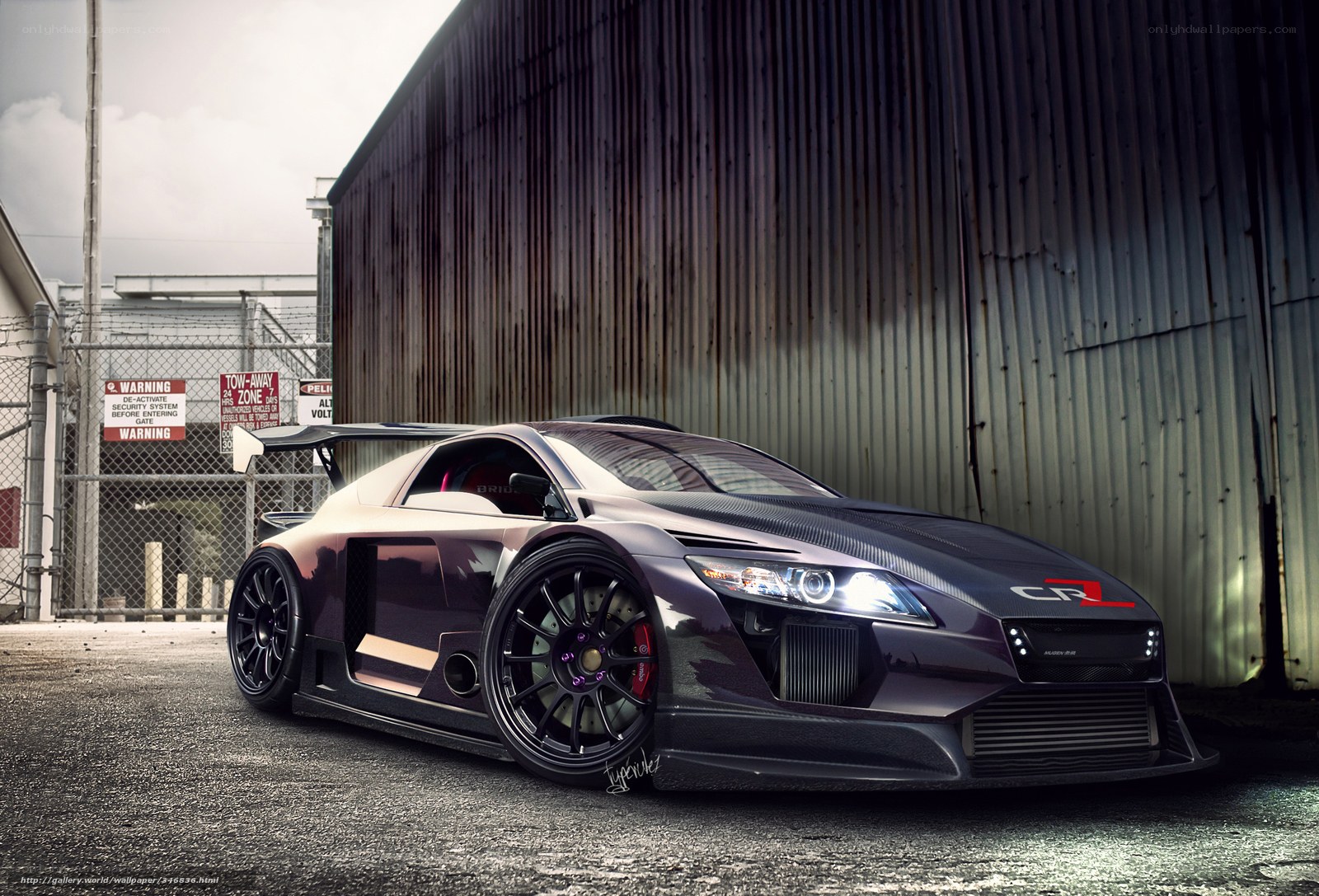 dark sports car in industrial setting