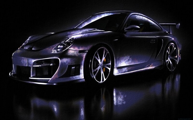 dark sports car in spotlight