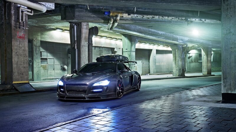 dark sports car in underground garage