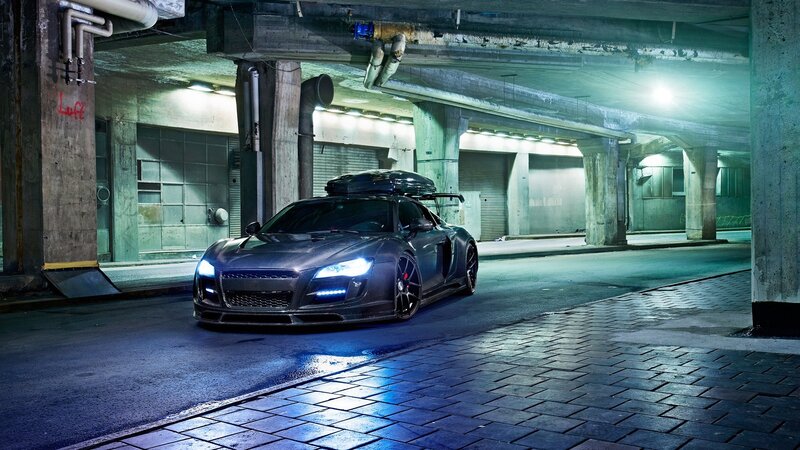 Dark sports car in underground garage
