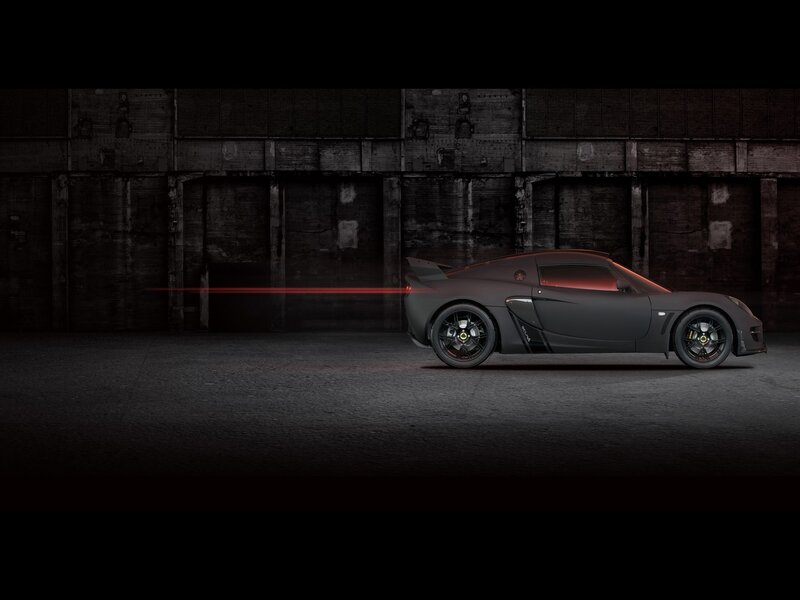 dark sports car in warehouse