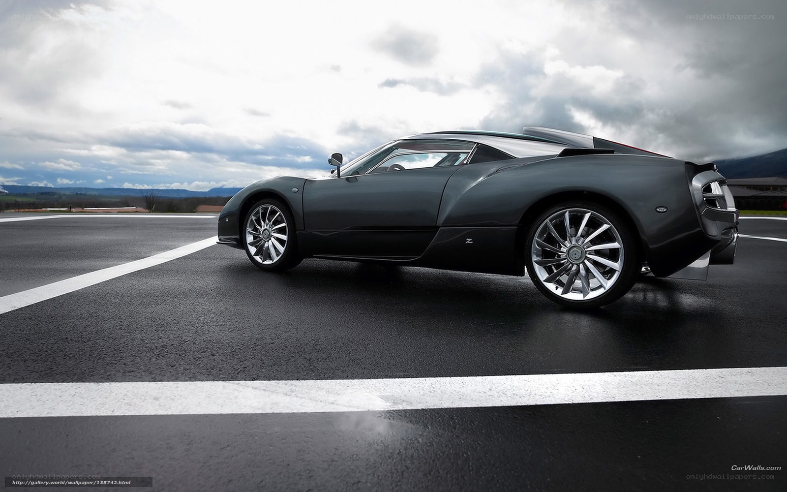 dark sports car on track