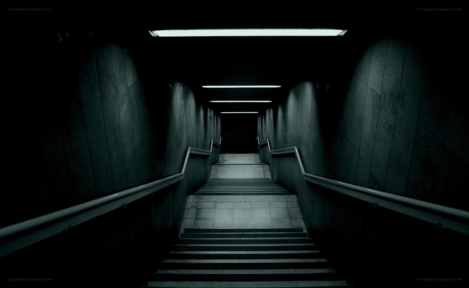 dark stairwell with fluorescent lights