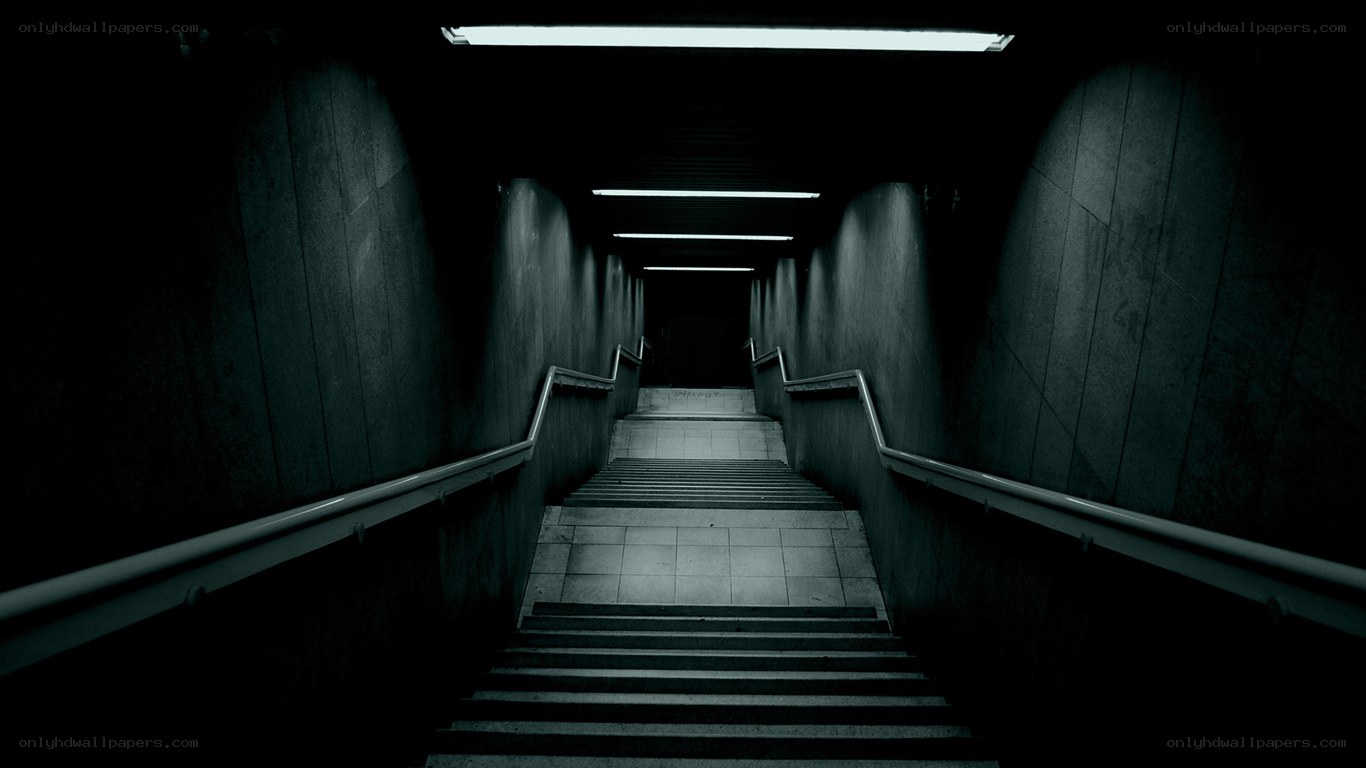 dark stairwell with fluorescent lights