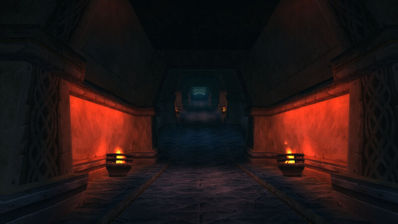 dark stone corridor with torches