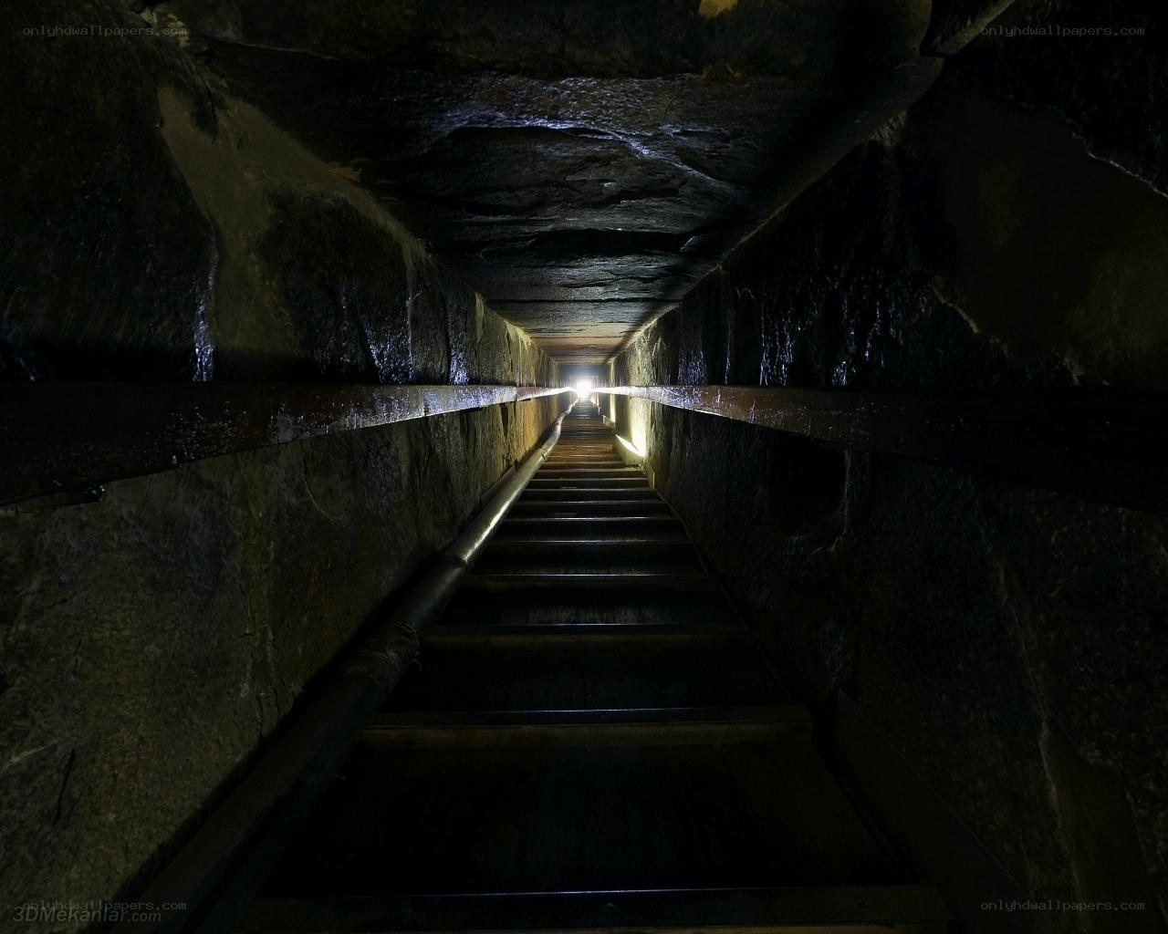 dark stone tunnel staircase