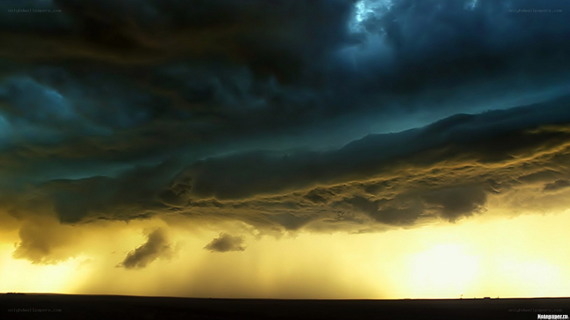 Dark storm clouds at sunset